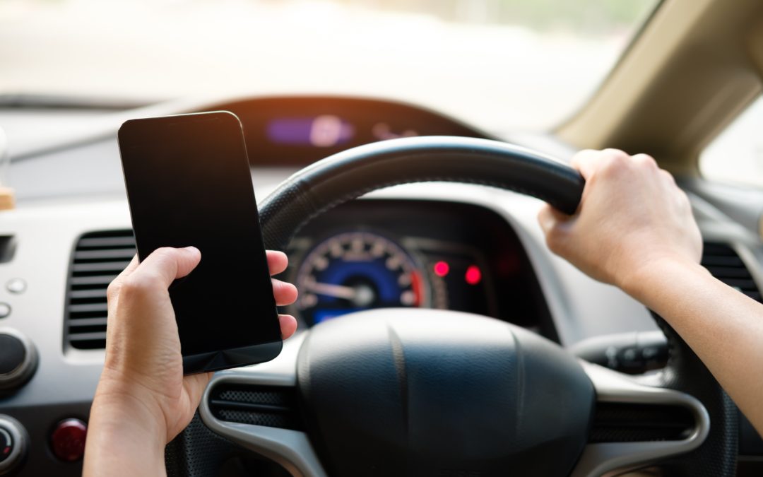 Distracted Driving and what it means for your Insurance